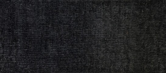 Fototapeta na wymiar Midnight Plush: A Black Carpet Texture with a Velvety Touch