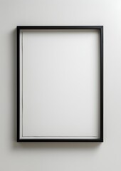 black square frame against a white wall,