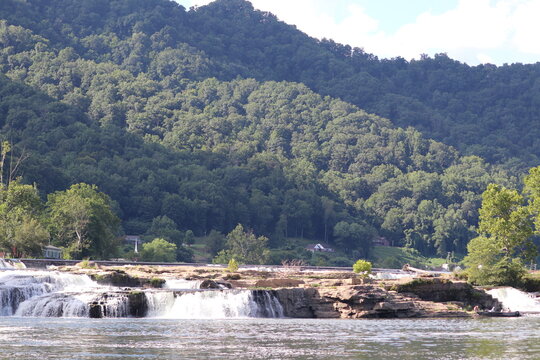 Waterfall and dam in a small river town in West Virginia. 