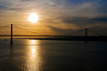 Fototapeta na wymiar Bridge at Sunset in Lisbon, Portugal