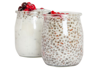 Set of yogurt jars with chia seeds, granola, oatmeal and berries in a glass jar. On a blank background
