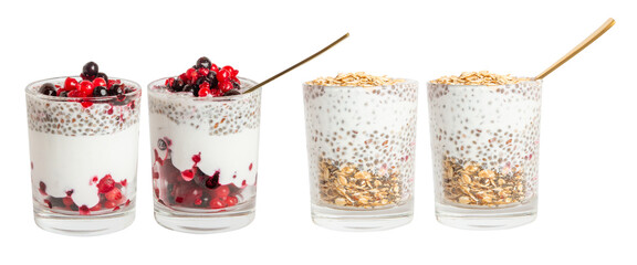 A set of jars of yogurt with chia seeds, granola and berries in a glass jar. On a blank background