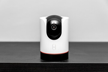 indoor CCTV wireless IP security camera with 360 degrees rotating head, Concept of home security...