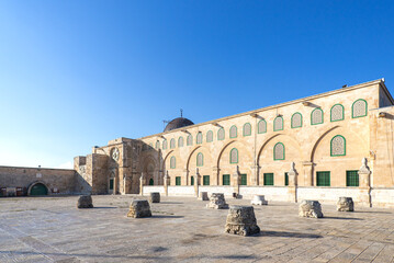 Al-Aqsa Mosque exterior with column tops exposition