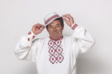 Mature man in a national Slavic shirt