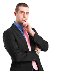 Thoughtful young man in a business suit with a contemplative exp