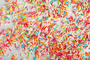Fototapeta na wymiar Candy Sprinkle, Donut Rainbow Sprinkles, Sweet Color Glaze, Small Vermicelli