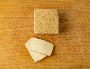 Tofu Cheese Isolated, Smoked Vegan Cheese Slice, Sliced Soya Bean Curd, Soy Protein or TSP