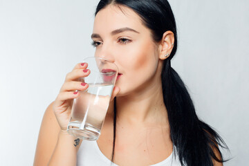 Smiling Young Woman with glass of Water