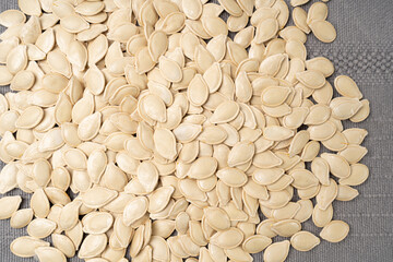 Whole Pumpkin Seeds in Shell Isolated, Raw Pepita Grains, Scattered Green Healthy Nuts