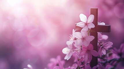 Wooden cross is embraced by a delicate array of pink flowers against a backdrop of rosy bokeh evoking a profound sense of spiritual tranquility