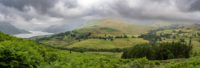 Fototapeta premium Ullswater lake and meadows in Lake district, England