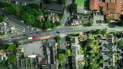 Aerial view from a drone flying above green Brighton streets in summer, East Sussex, UK