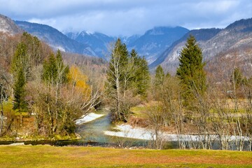 Tributary of Mostnica and Sava Bohinjka river and mountains in Julian alps in Slovenia