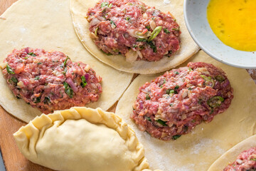 Close-Up of Preparing Homemade Beef Stuffed Empanada - Captivating 4K Ultra HD Image of Culinary Creation