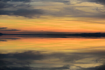 Naklejka na ściany i meble Beautiful Dawn at Salt Flats - 4K Ultra HD Image of Tranquil Desert Landscape