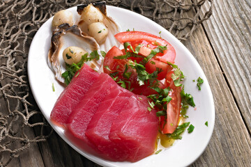 Close-Up of Fresh Tuna Sashimi with Tomato and Scallops - 4K Ultra HD Image of Exquisite Seafood Dish