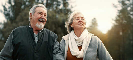 Love, smile and a senior couple walking outdoor in a park together for a romantic date during...