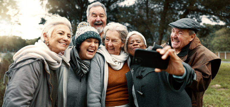 Excited, selfie and group of senior friends in outdoor green environment for fresh air. Diversity, happy and elderly people in retirement taking picture together while exploring and bonding in a park