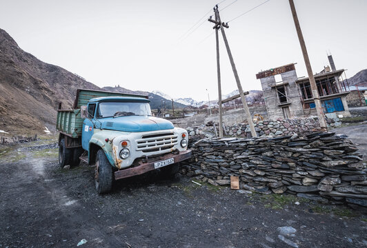 Gergeti, Georgia - April, 25, 2015: Old ZIL-133 truck in Gergeti village near Stepantsminda, formerly Kazbegi in Mtskheta-Mtianeti region