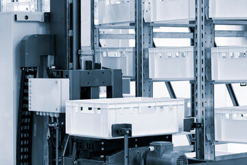 modern distribution warehouse with boxes on racks