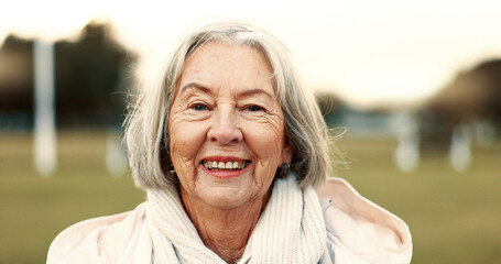 Face, elderly woman and happy in nature on vacation, holiday or travel in winter. Portrait, smile...
