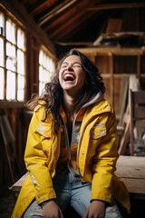 Obraz na płótnie Canvas A woman laughing in a yellow jacket. Generative AI.