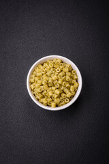 Delicious ditali pasta from durum wheat with salt and spices