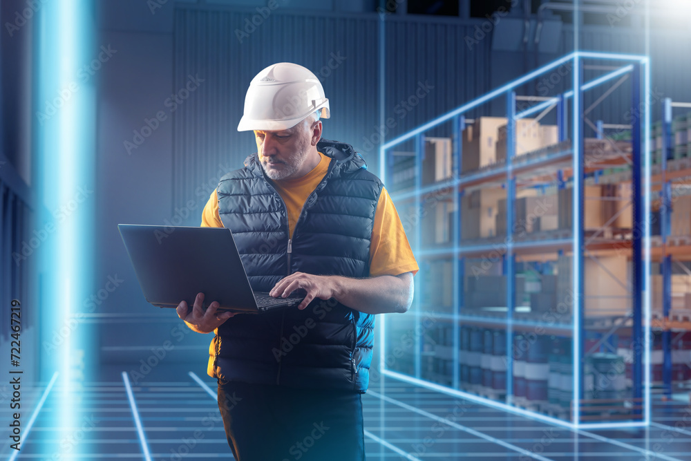 Poster man warehouse contractor. storekeeper with laptop. manager in factory storage area. logistician work