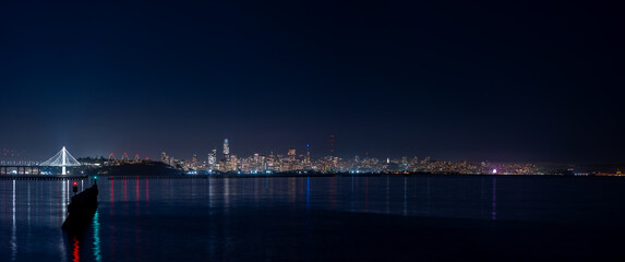 Wide Panorama of the downtown San Francisco buildings From across the bay - obrazy, fototapety, plakaty