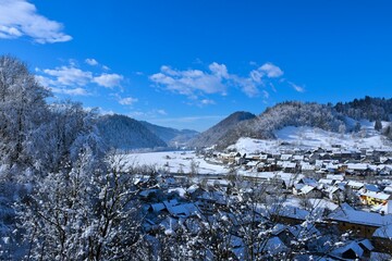 View of Poljanska dolina valley and buildings in the town of Škofja Loka in Gorenjska, Slovenia in winter