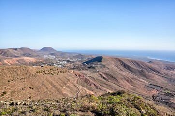 Lanzerote, Spain - December 24, 2023: Highways and sights amongst the volcanic landscapes on the...