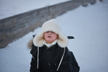 The Winter Wanderer, A Young Adventurer Embracing Natures Frozen Realm