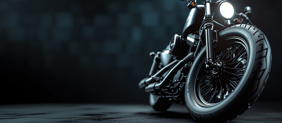 Close-up on a black motorcycle on a dark background - banner for copyspace