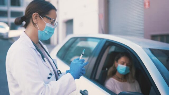 Doctor, car woman with vaccine syringe, booster shot or covid 19 protection for medical policy, compliance or disease. Medicine, wellness service and nurse with immunization injection for patient