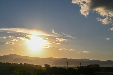 the sun sets behind the mountains in Cyprus 4