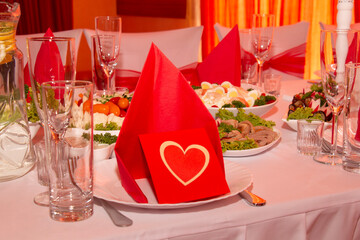Banquet for Valentine's Day, table with very tasty cold cuts and fish dishes.