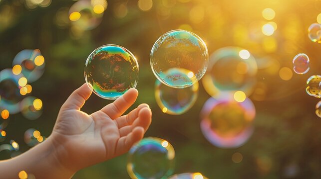 Happy children play with soap bubble in amusement summer park wallpaper background