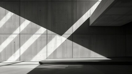A monochromatic building's symmetrical shadows cast parallel lines upon a composite material wall, creating an abstract and captivating display of light