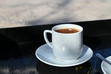 Turkish coffee in a white cup 8