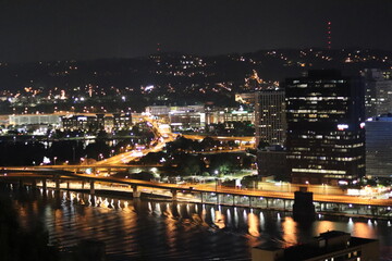 Fototapeta na wymiar Panoramic view of downtown and river. Architecture of Downtown Pittsburgh. Southwest Pennsylvania at the confluence of the Allegheny River and the Monongahela River, the Ohio River.