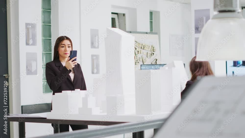 Poster architect scanning 3d building model on smartphone to check measurements and architectural scales, s