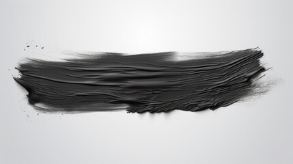 Simple brush stroke of black paint on clean white background. Perfect for adding minimalist touch to any design project