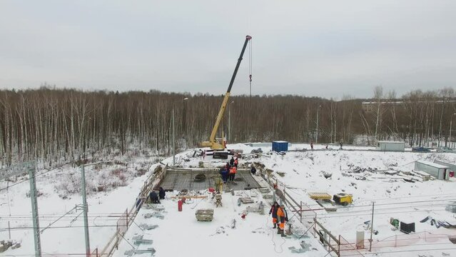 Builders work on construction site of Bogorodsky overbridge 