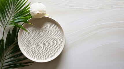 White sand zen pattern with palm leaves, lines drawing, spa background for relaxation.