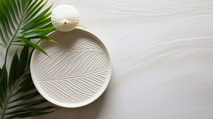 Fotobehang White sand zen pattern with palm leaves, lines drawing, spa background for relaxation. © Ilja