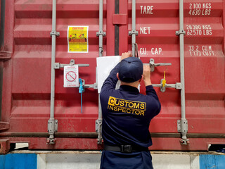 Customs officers carry out investigations on import and export goods in containers. Customs...