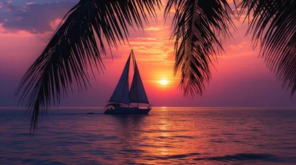 Photo sur Plexiglas Coucher de soleil sur la plage sunset view with silhouette of sailboat on beach and palm coconut tree