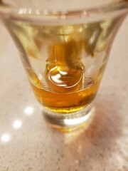 Shot Glass with a Small Amount of Brandy in it