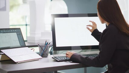 Architect designing blueprints for house remodeling project, using modern cad software on computer to create new floor plan for customers. Engineer takes measurements on layout sketches in office.